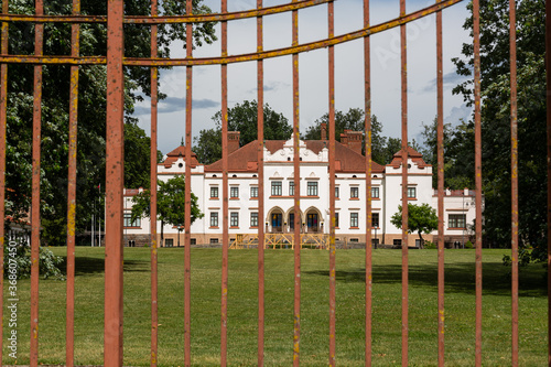 Rokiskis manor and park in sunny summer day photo