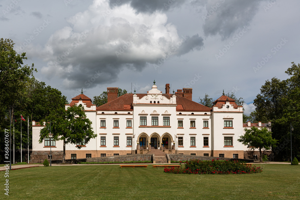 Rokiskis manor and park in sunny summer day
