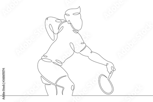 young man athlete playing badminton