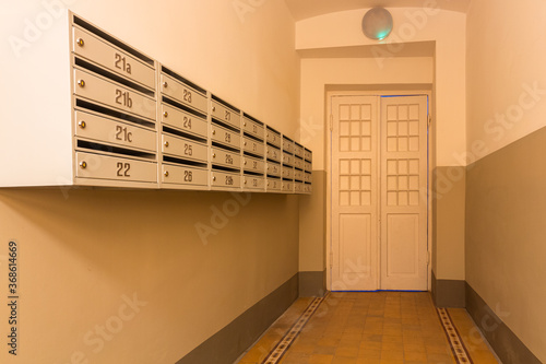 Staircase with staircase window and mailboxes photo