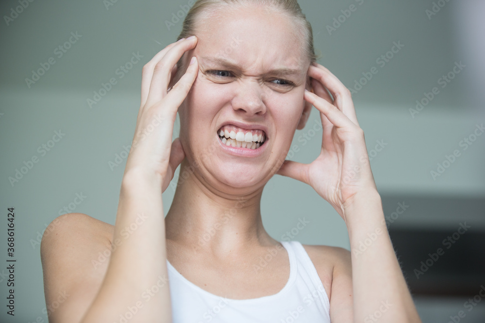 Furious upset young female person having a mental breakdown at home. Emotional crisis. Furious upset young female person having a mental breakdown at home. Emotional crisis.