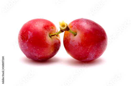 Small cherry plums, isolated on white background