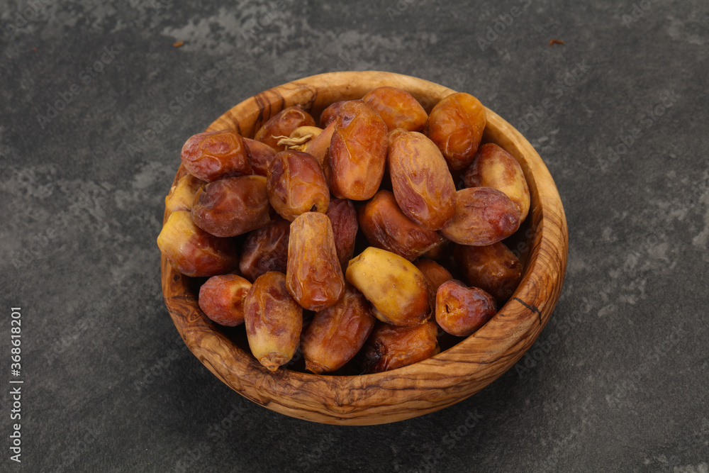 Sweet tasty dry dates in the basket Sweet tasty dry dates in the basket