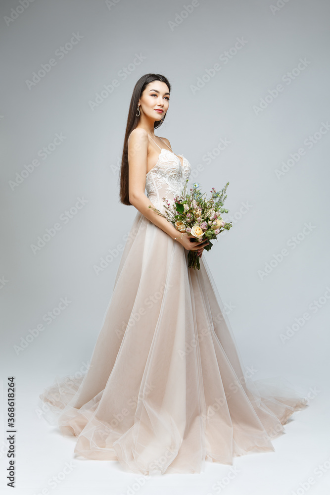 beautiful brunette girl with natural makeup isolated on white