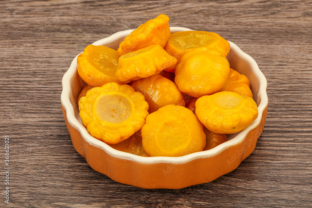 Marinated yellow patisson in the bowl Marinated yellow patisson in the bowl