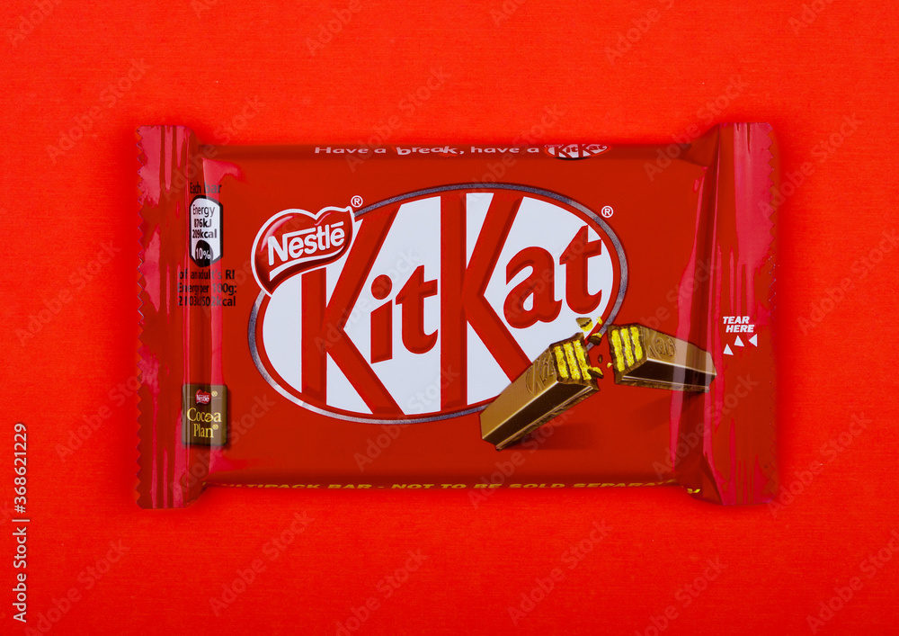 LONDON, UK -DECEMBER 07, 2017: Kit Kat chocolate bar on red. Bars Kit ...