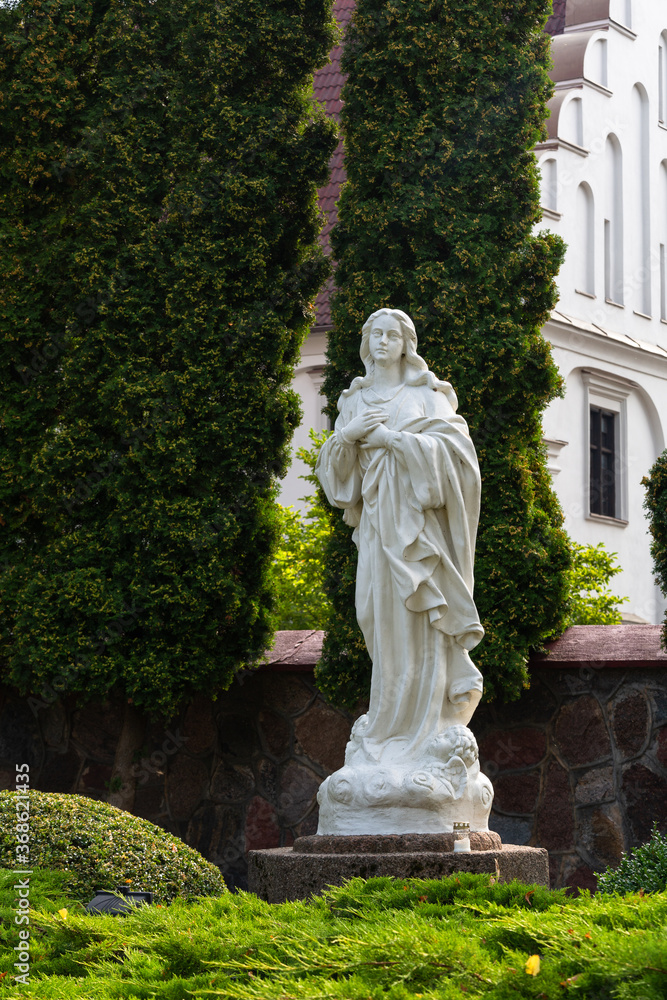Obraz premium Catholic Church and symbols in Kretinga
