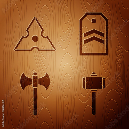 Set Battle hammer, Japanese ninja shuriken, Medieval axe and Chevron on wooden background. Vector.