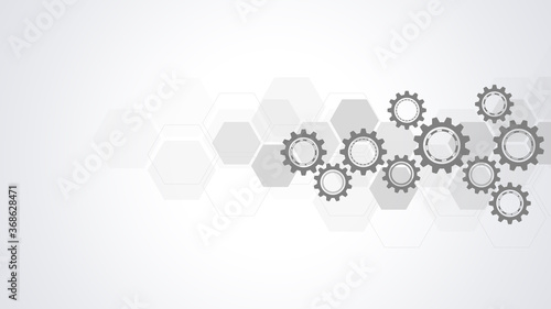 Cogs and gear wheel mechanisms. Hi-tech digital technology and engineering. Abstract technical background.