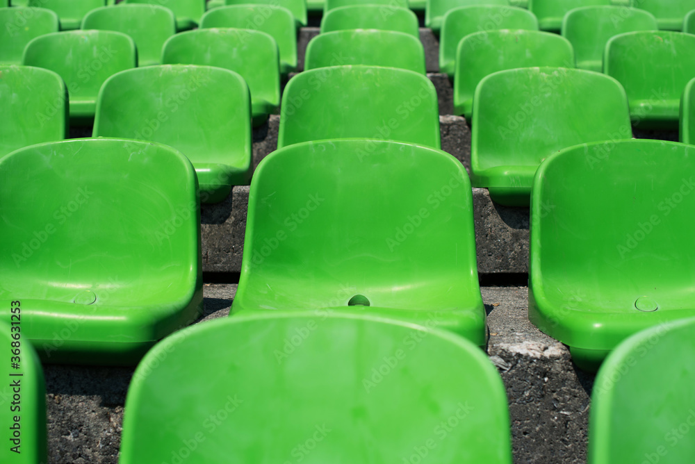 Naklejka premium chair in row of stadium seats 