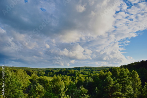 Summer clouds over the forest in the Nature Park Vishtynetskiy