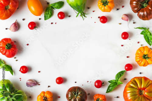 food composition. italian cuisine cooking concept. frame made of colorful organic vegetables on white background. top view