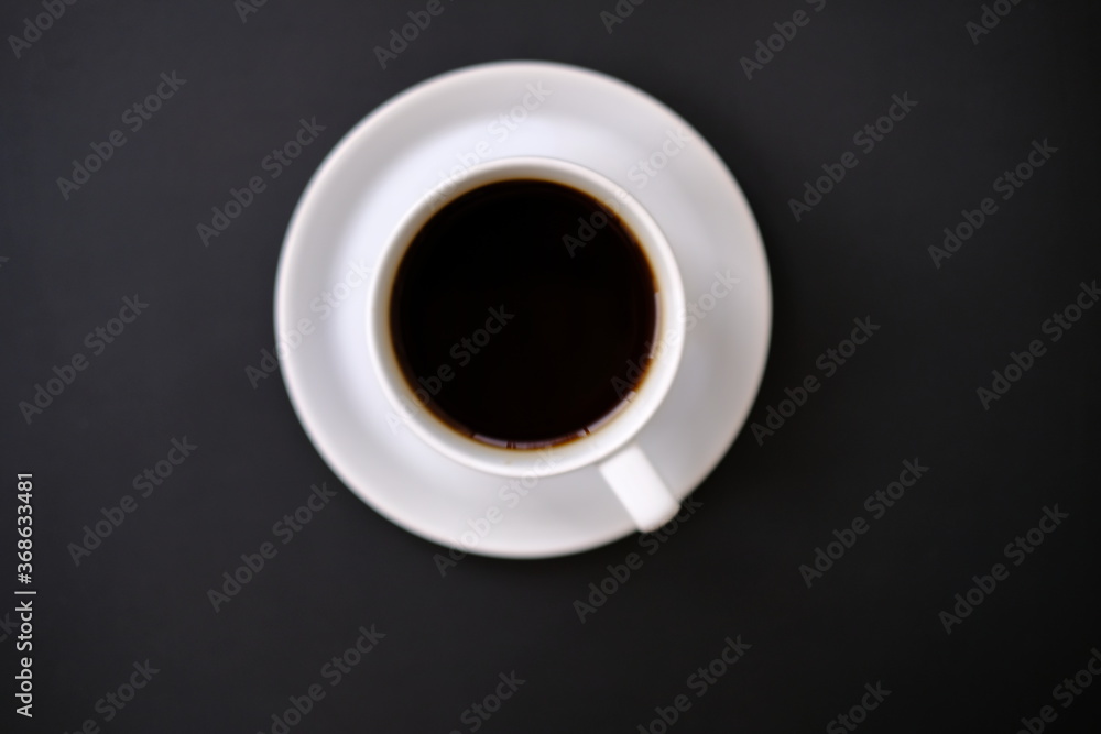 Top view coffee cup and coffee beans on old wood table background, space for text Top view coffee cup and coffee beans on old wood table background, space for text