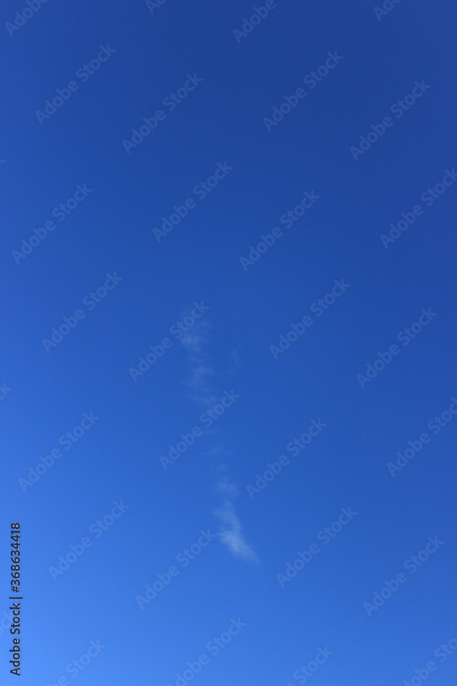 Small white cloud in the sky. Russia.