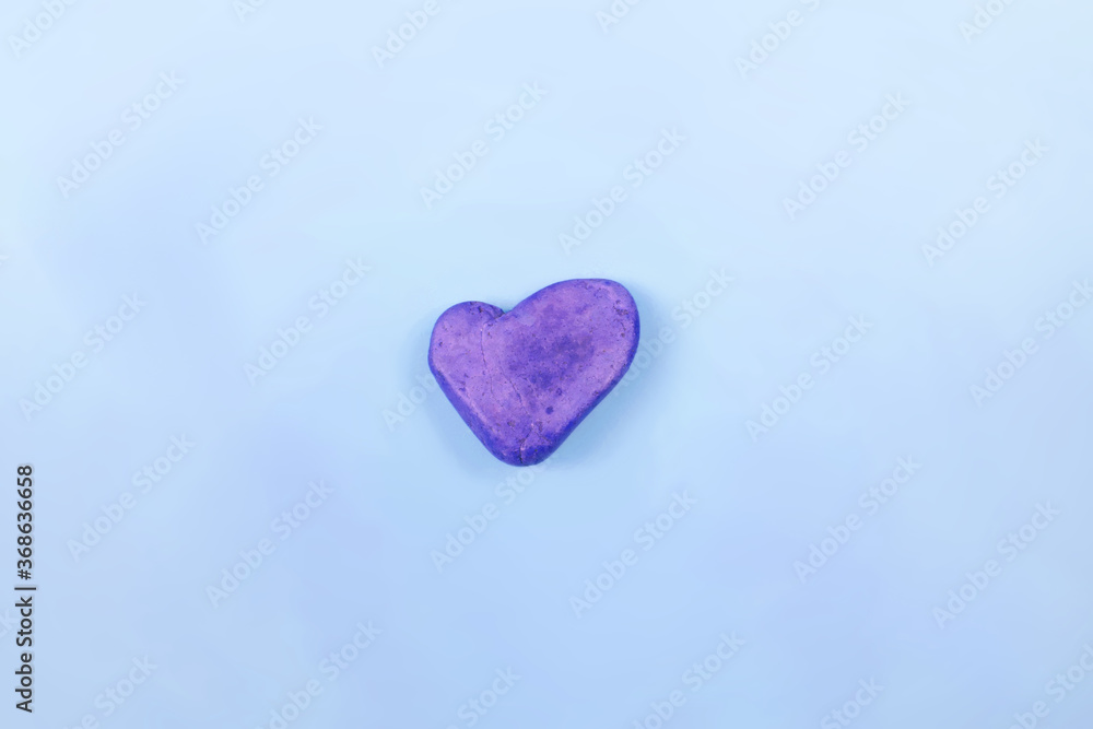 Obraz premium heart shaped stone toned in blue and lilac 