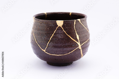 Antique kintsugi, tea pottery set chawan bowl restored with gold.
