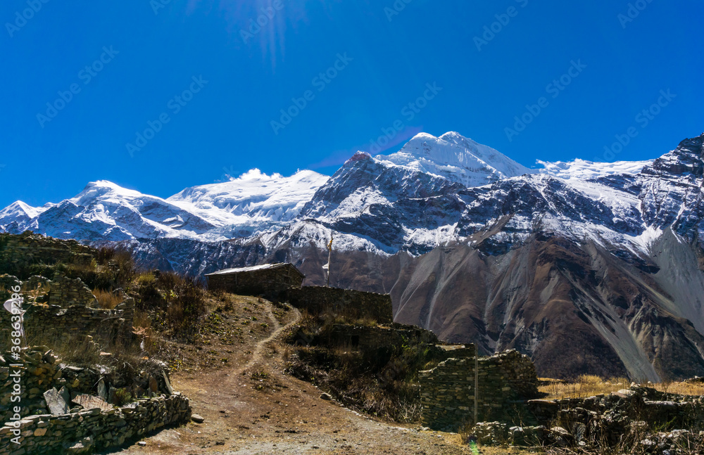 Ruins of stone houses at Old Khangsar in Annapurna Conservation area of Nepal. Khangsar is on Manang  to Tilicho Lake trail that also connects with the main trail of Annapurna Circuit.