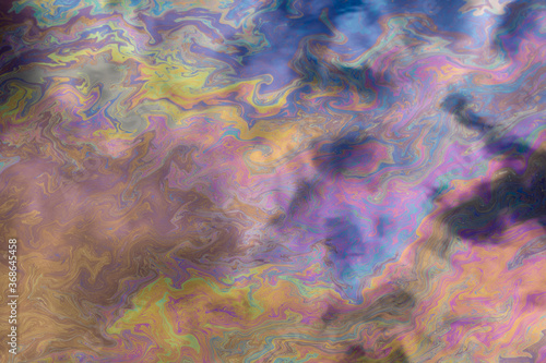 abstract colorful background. multi-colored oil slick on the surface of the water.
