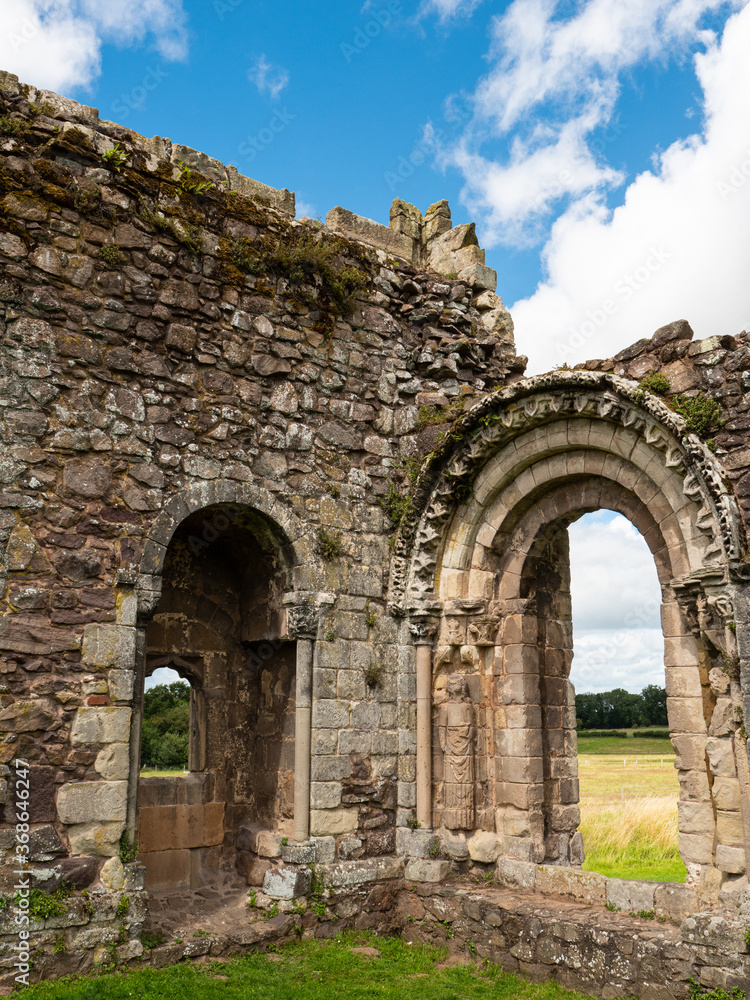 The doorway from cloister to church in the ruins of the 12th century Haughmond Abbey, a medieval Augustinian monastery near Shrewsbury in Shropshire, England - now in the care of English Heritage.