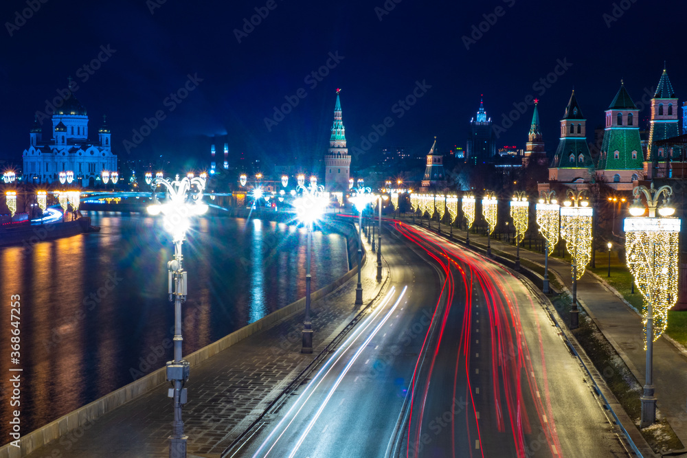 Moscow. Russia. Kremlin embankment. Kremlin towers. Christmas decorations in the capital. New Year's Moscow with a quadcopter. Highway at night. Russian roads. Moscow on a winter night.