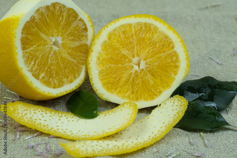 Sliced lemon with peeled zest Sliced lemon with peeled zest