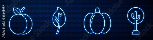 Set line Pumpkin, Peach fruit, Leaf or leaves, Tree and Honey dipper stick. Glowing neon icon on brick wall. Vector.