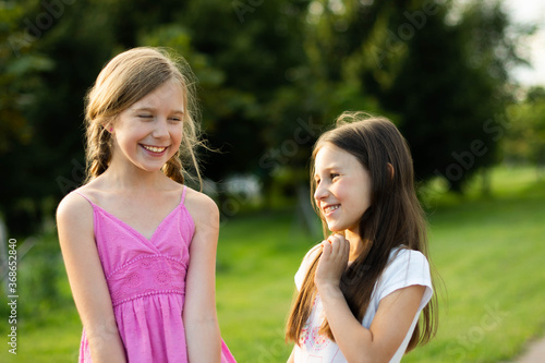 two young girls laugh