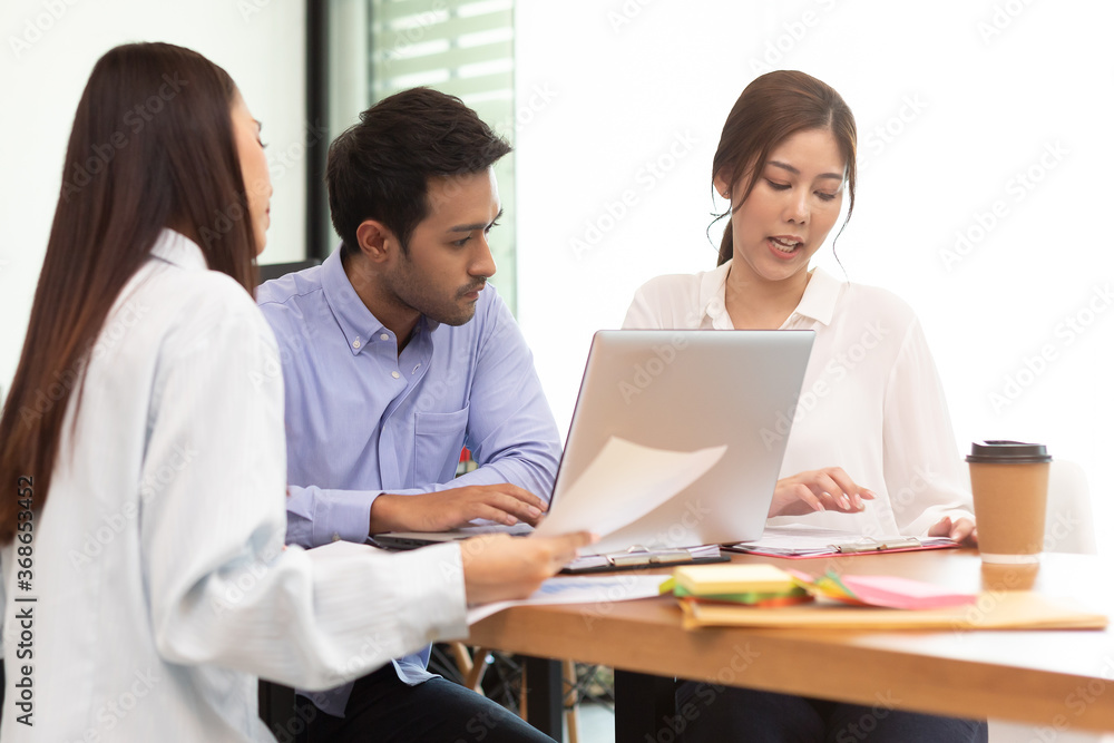 Asian business man and women meeting and talk about job in office. Asian business man and women meeting and talk about job in office.