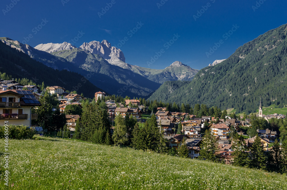 Vigo di Fassa village, a charming commune in Trentino, Alto-Adige, Catinaccio/Rosengarten Dolomites, South Tirol, Italy.