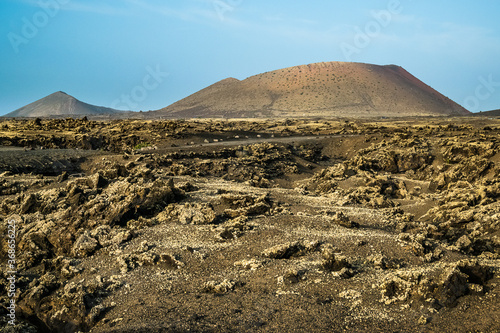 Volcanic desert landscape on Lanzarote island. Canary Islands, Spain.