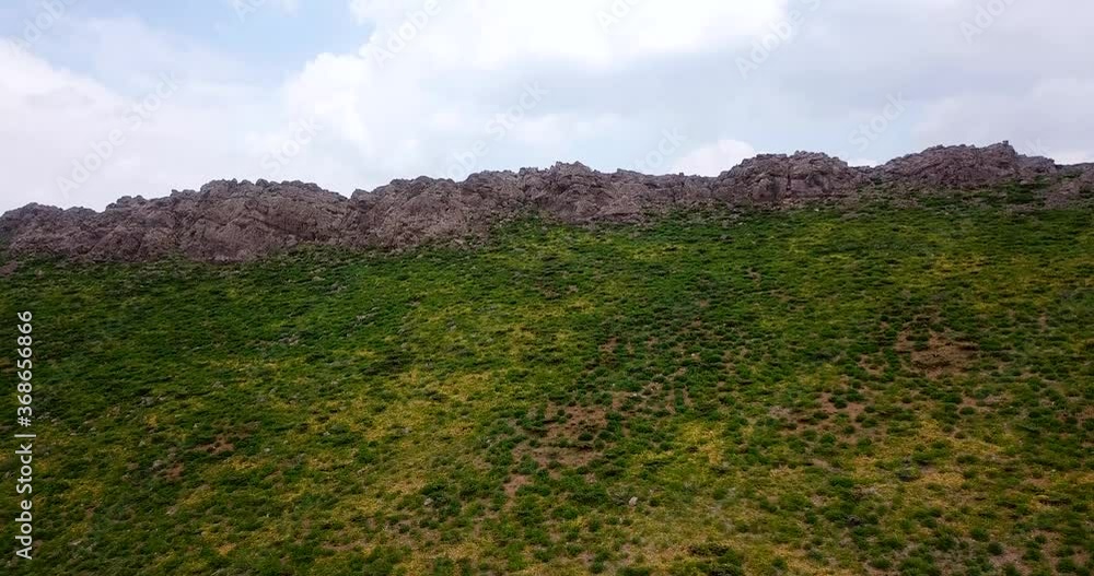 Unbelievable Green Meadow Aerial Lawn View, Rising and Open A Wide Landscape of Farm Fields And Mountains View Under The Clouds Shadow Unbelievable Green Meadow Aerial Lawn View, Rising and Open A Wide Landscape of Farm Fields And Mountains View Under The Clouds Shadow