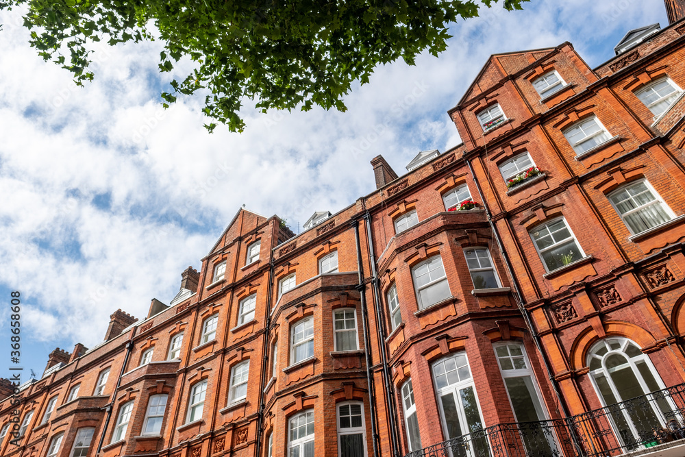 Beautiful terrace of red brick residential property in Kensington, London 