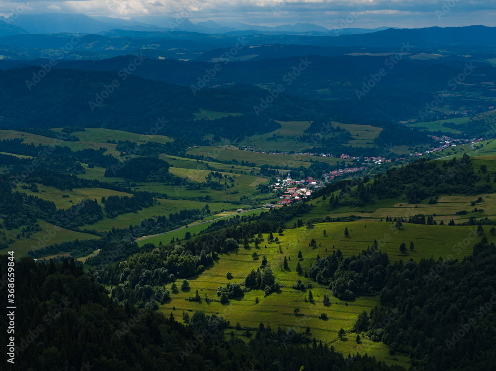 View from Mount Wysoka on the valley and mountain village. Pieniny National Park. Polish-Slovakian border