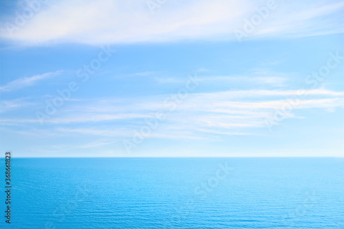 Beautiful ripply sea under blue sky with clouds