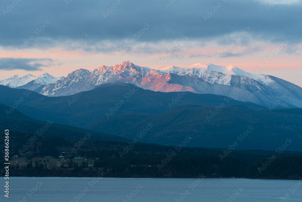 Pacific Ocean and Olympic mountains with snow