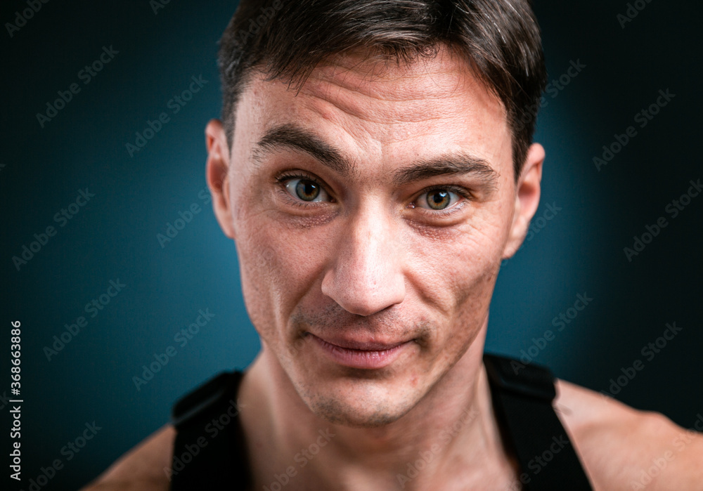 Close up studio headshot portrait of young smiling caucasian man stand look at camera posing, feel positive optimistic Close up studio headshot portrait of young smiling caucasian man stand look at camera posing, feel positive optimistic
