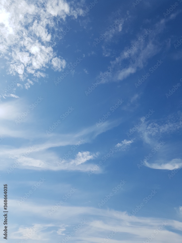 Obraz premium White clouds in blue sky.