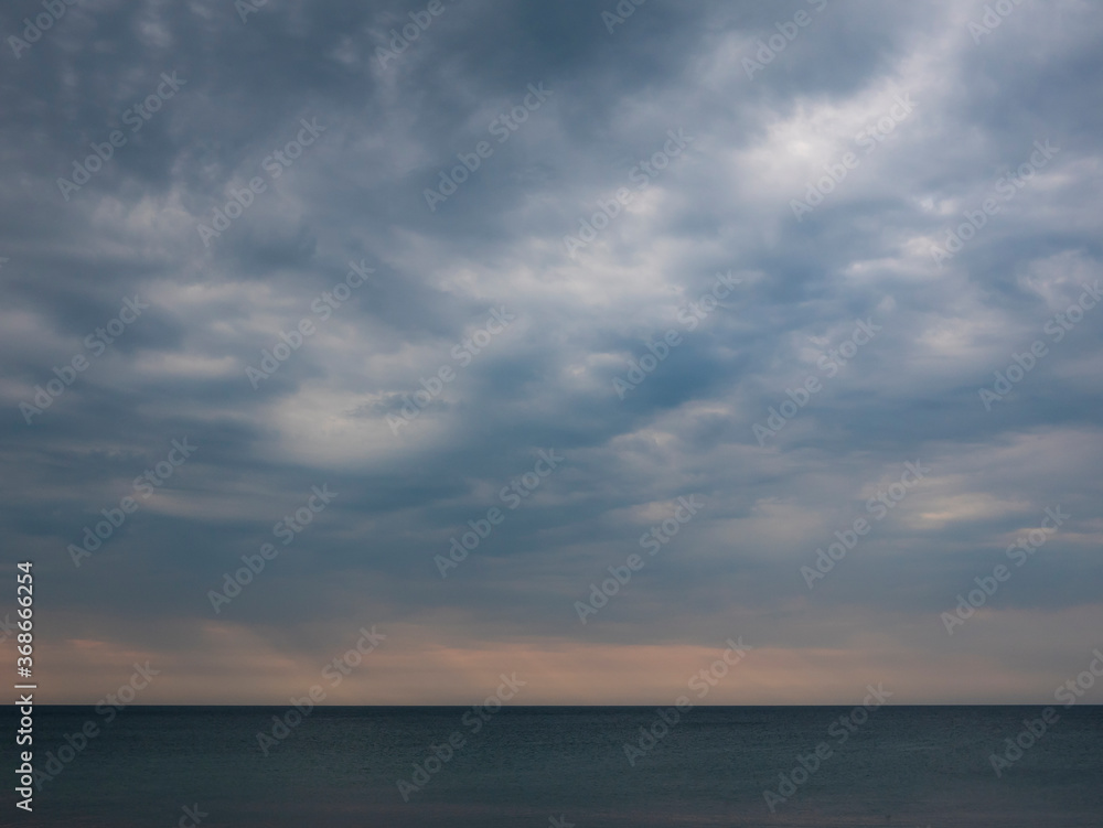 Evening sky over the sea. Horizon over the sea surface
