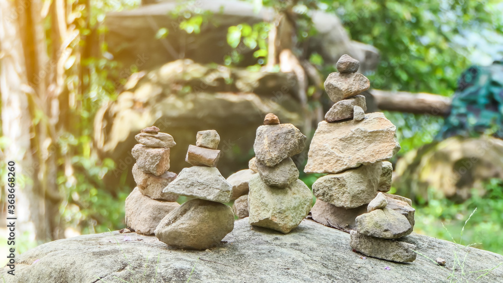 Small stones that are arranged vertically Is a belief Small stones that are arranged vertically Is a belief