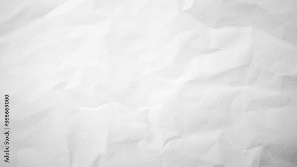 Obraz premium Crumpled paper texture background.Crumpled paper ball isolated on white with clipping path.abstract background of crumpled white paper