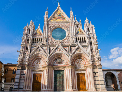 Stunning view of Siena Cathedral main facade, a medieval church now dedicated to catholic Assumption of Mary, Tuscany, Italy 