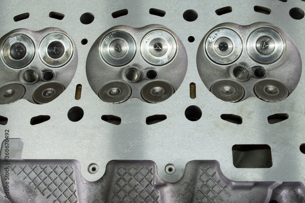 Intake and exhaust valves installed in the engine block head Intake and exhaust valves installed in the engine block head