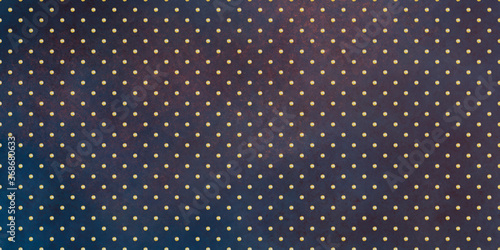 grunge elegant dark background with blue tint and gold dots. Dotted background.