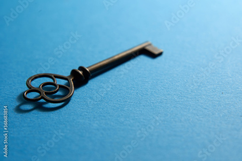antique key on the blue background © eskay lim