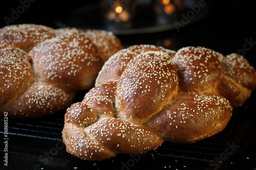 Challah. Braided bread with sesame seeds.