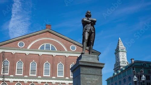 timelapse shot of Faneuil Hall and Samuel Adams statue medium shot photo