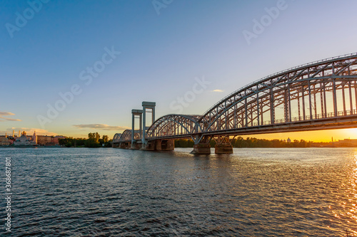 Saint Petersburg, Russia, June 13, 2020. White nights. View of the Neva River and the Finlyandsky railway bridge photo