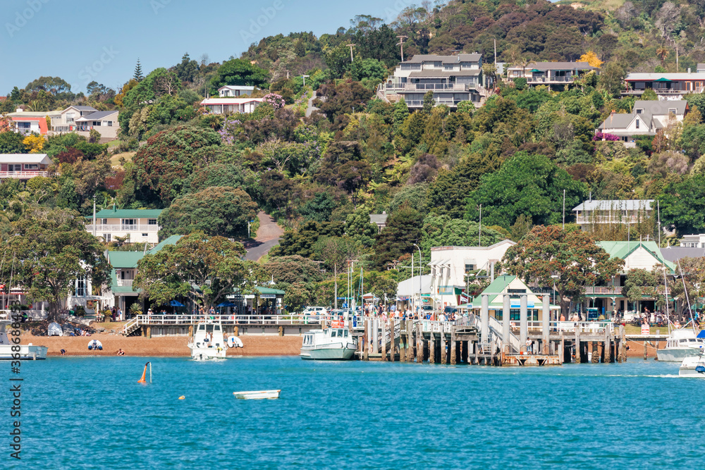 Pier of Russell in Bay of Islands with residential buildings