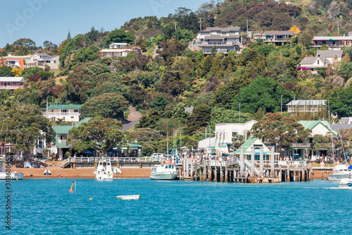 Pier of Russell in Bay of Islands with residential buildings
