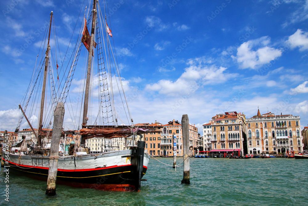 Fototapeta premium Old sailboat moored on Grand Canal in Venice, Italy.